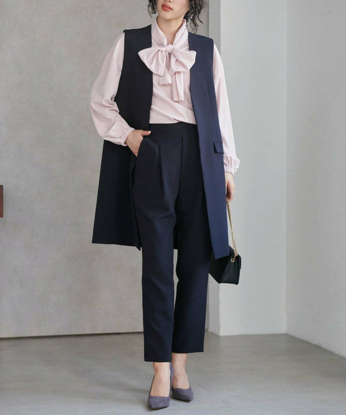 春コーデの女性