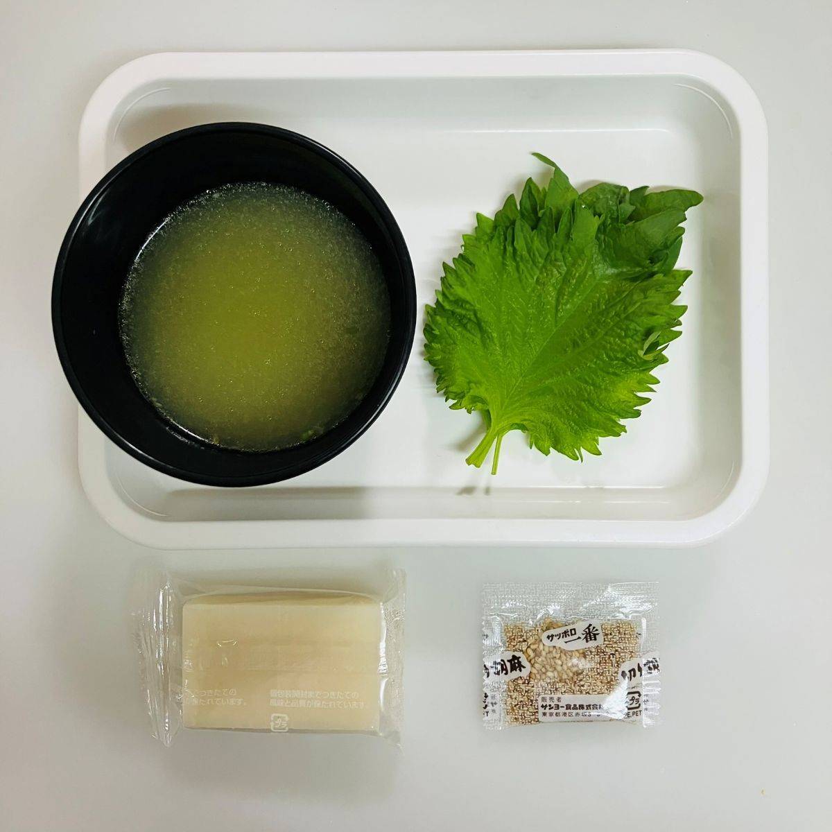 サッポロ一番公式の「サッポロ一番でお変わり ねぎだくスープ餅」のレシピ