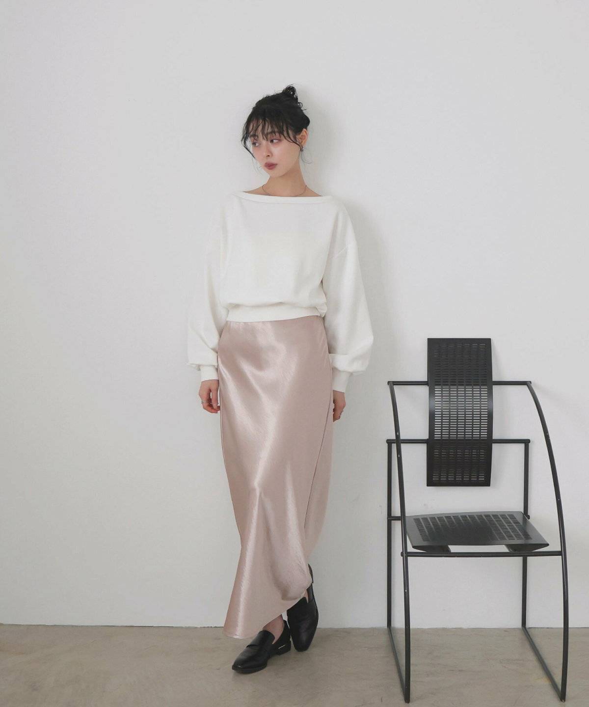 トレーナーを着た女性