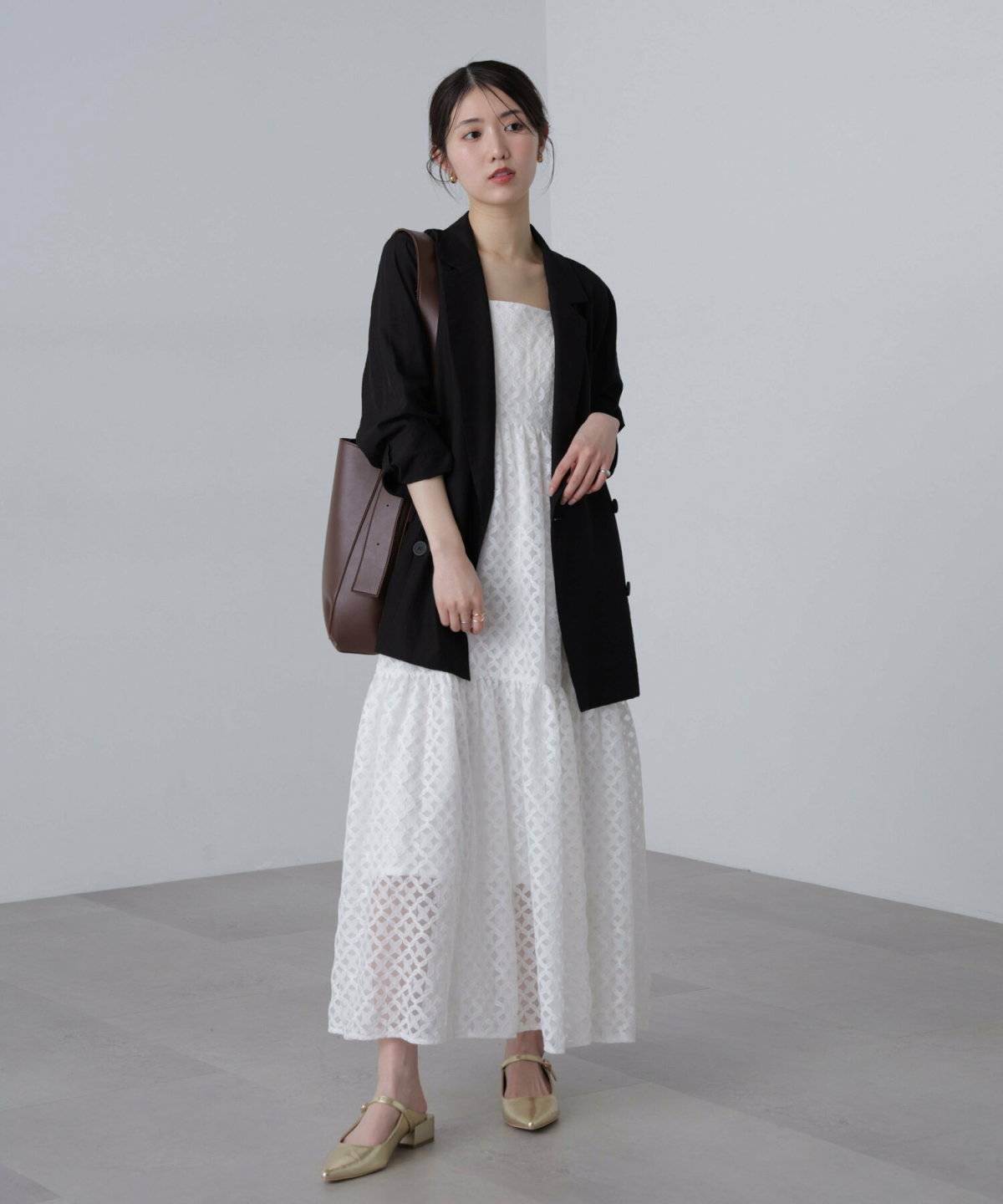 秋コーデの女性