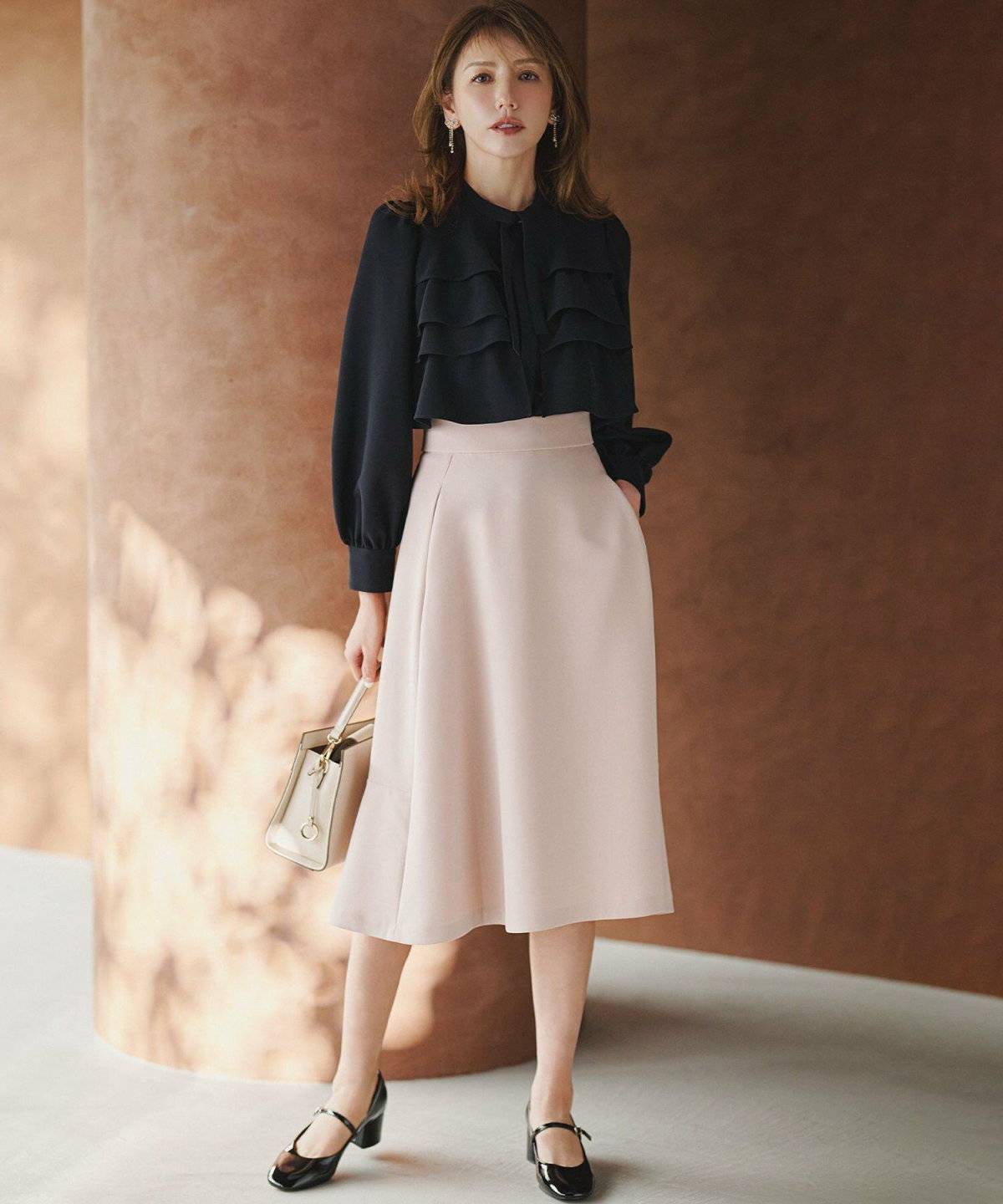 スカートコーデの女性