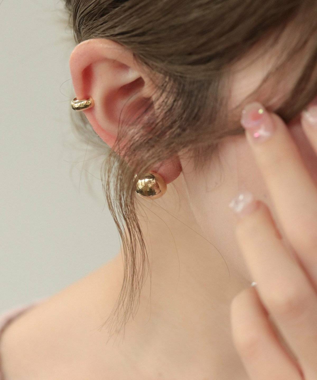 春コーデの女性