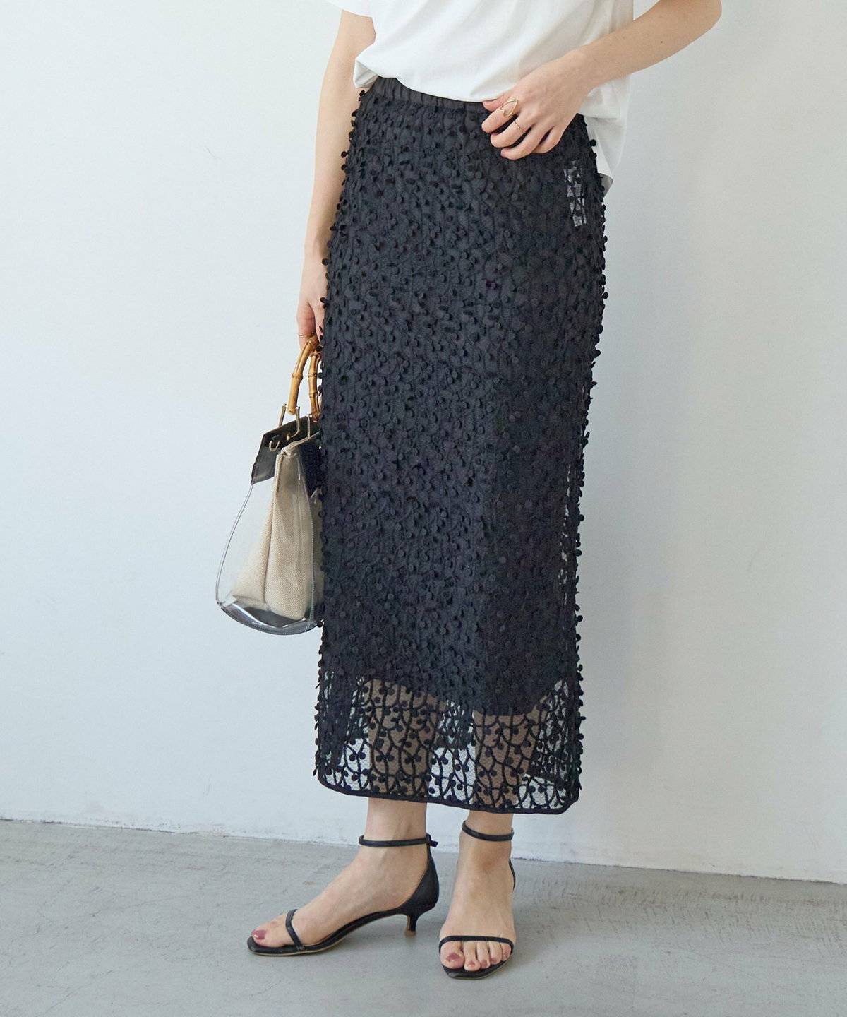 春コーデの女性