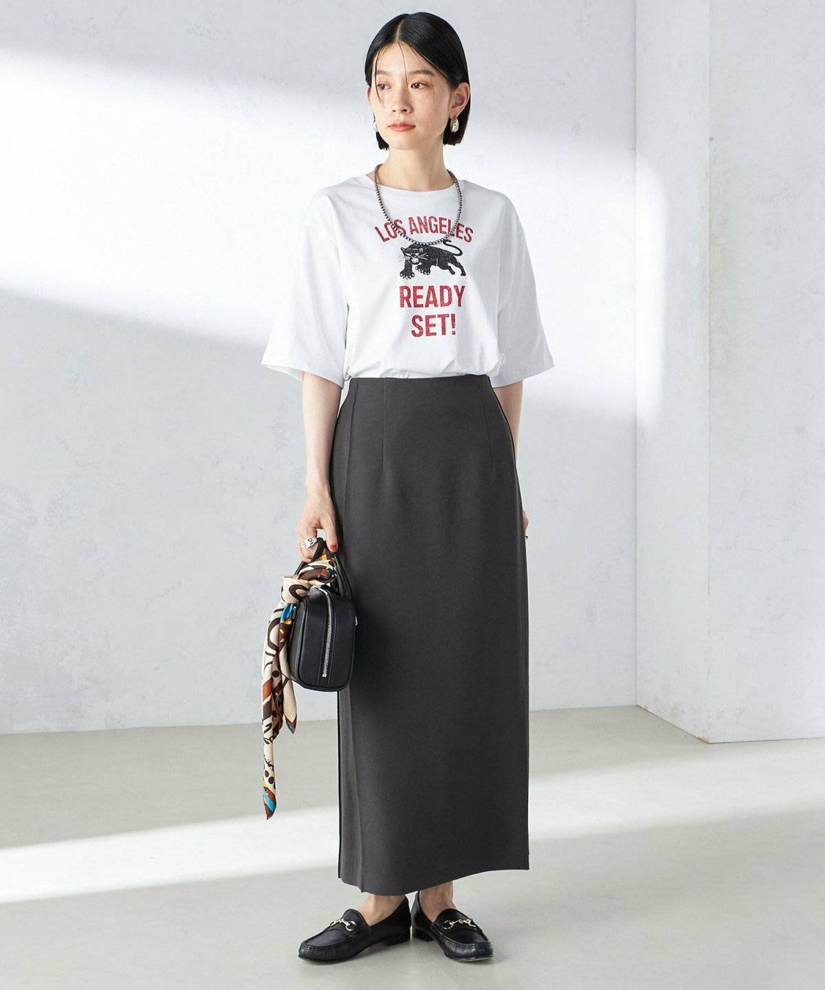 春コーデの女性