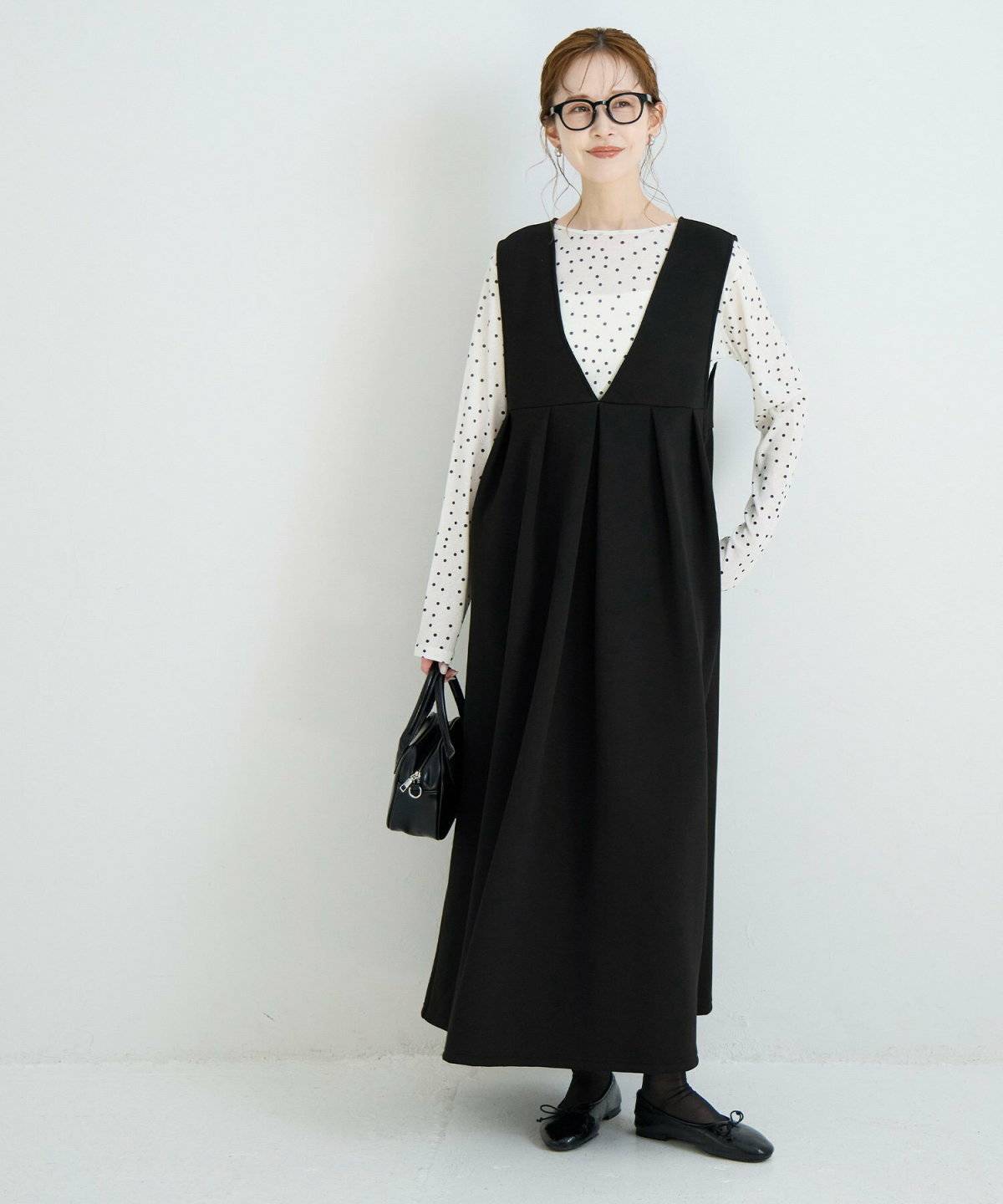 春コーデの女性