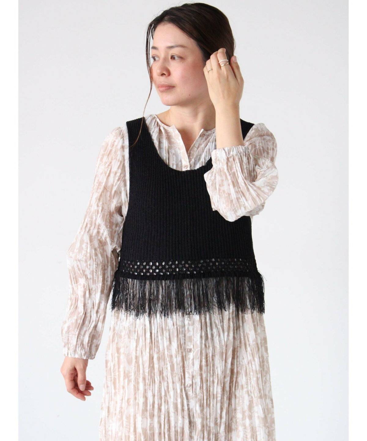 春コーデの女性