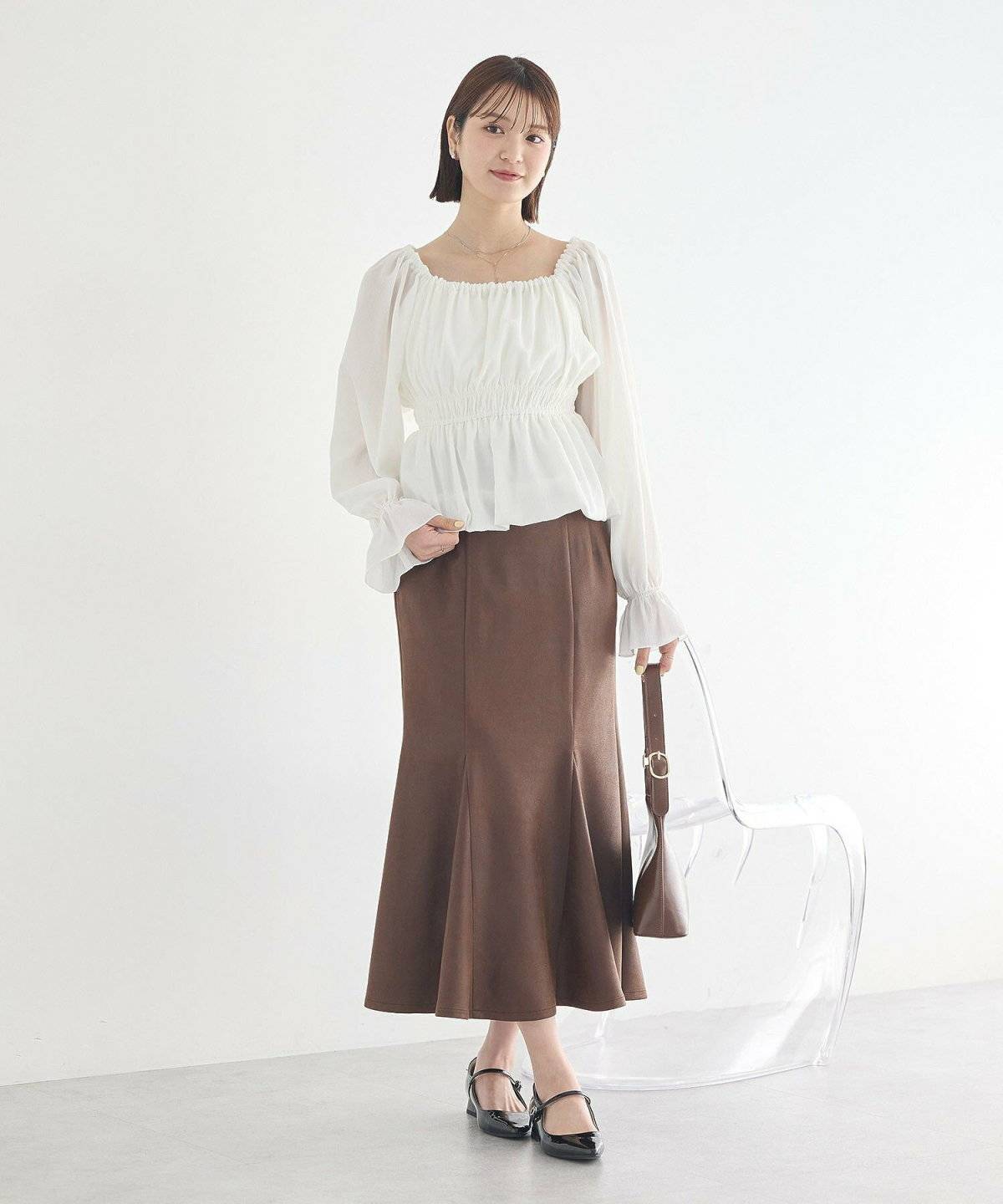 秋コーデの女性