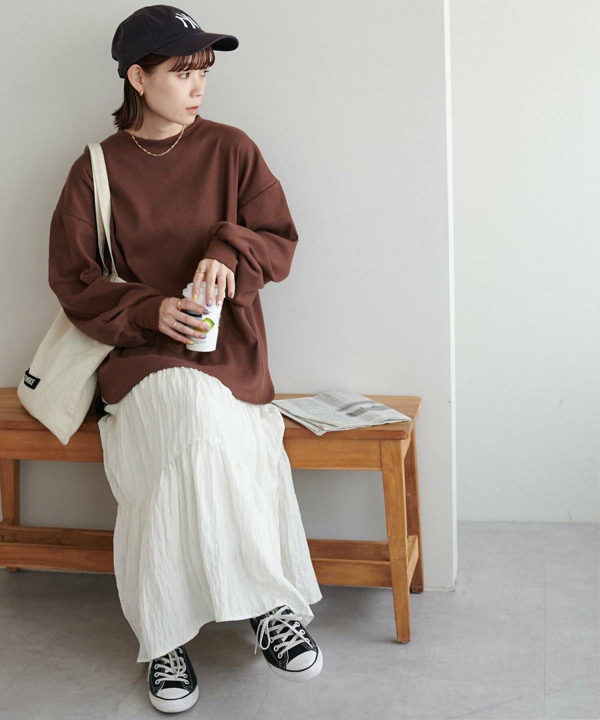 春コーデの女性