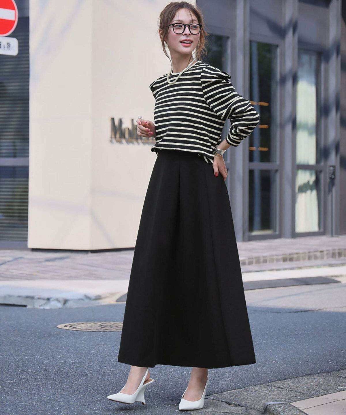 春コーデの女性