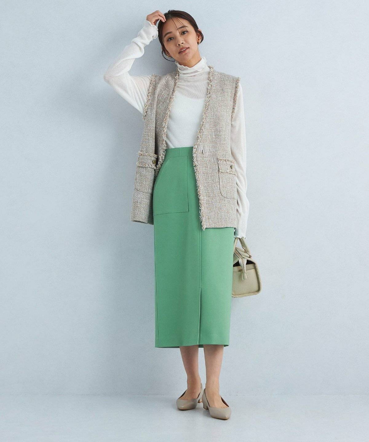 春コーデの女性