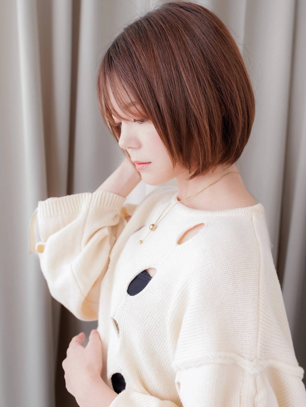 オレンジカラーのストレートボブ