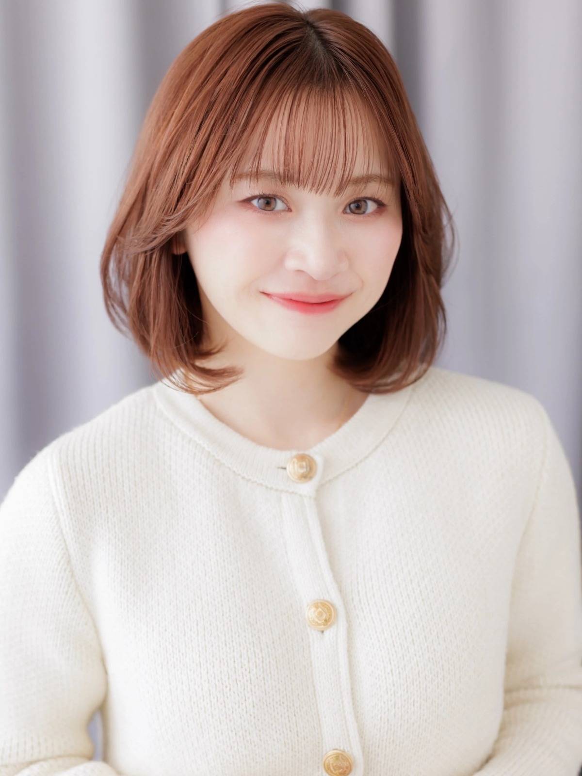 フェミニンワンカールボブ