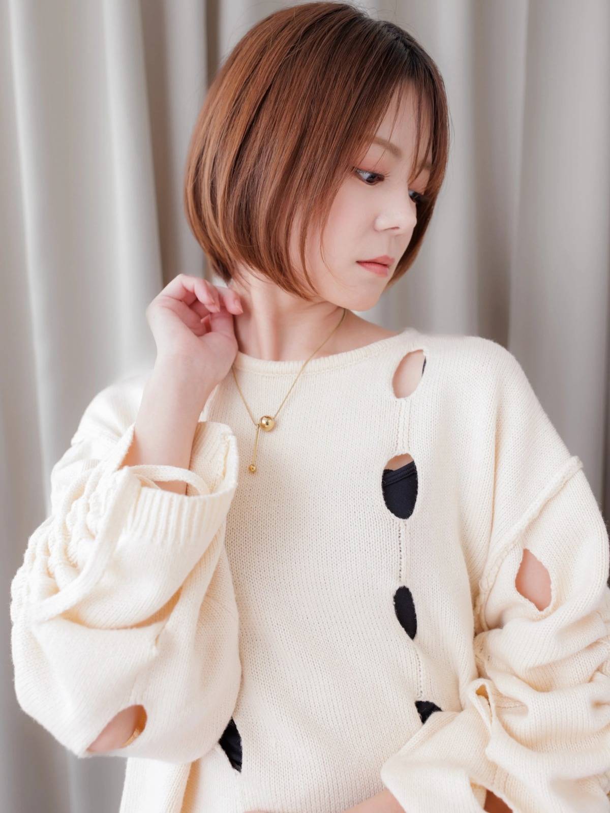 暖色カラーのまとまりボブ