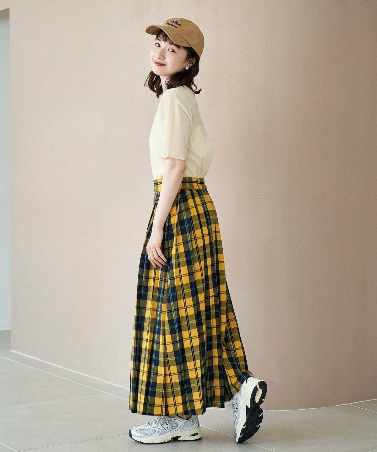 春コーデの女性