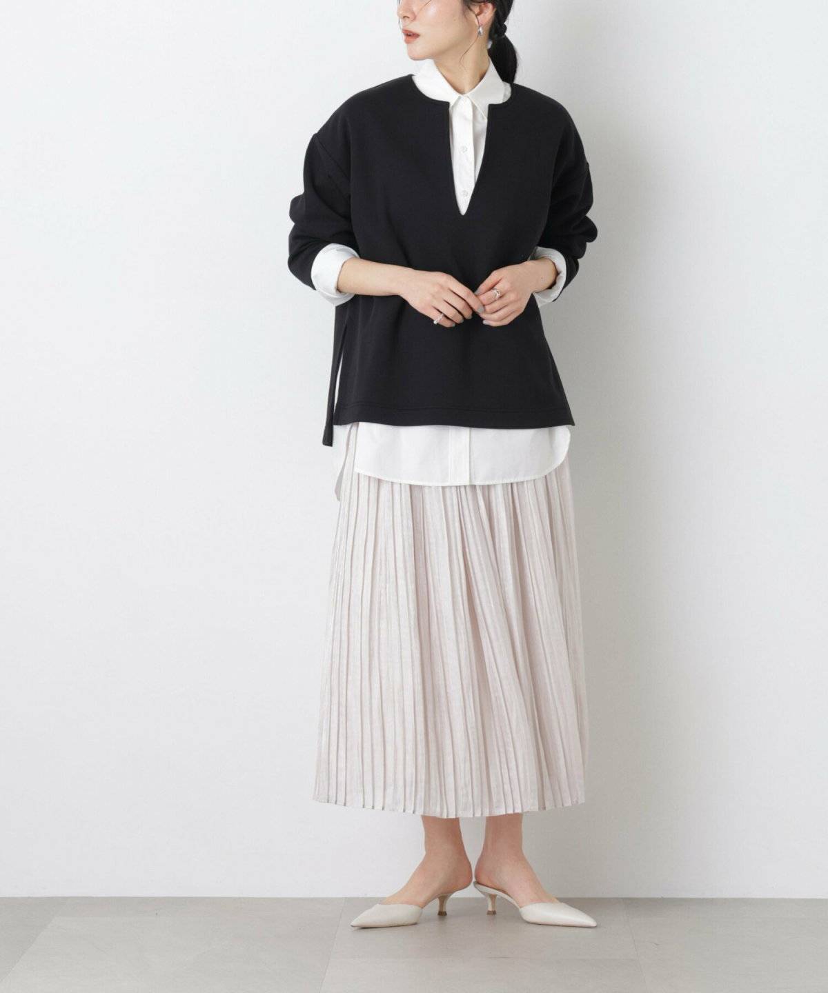 春コーデの女性