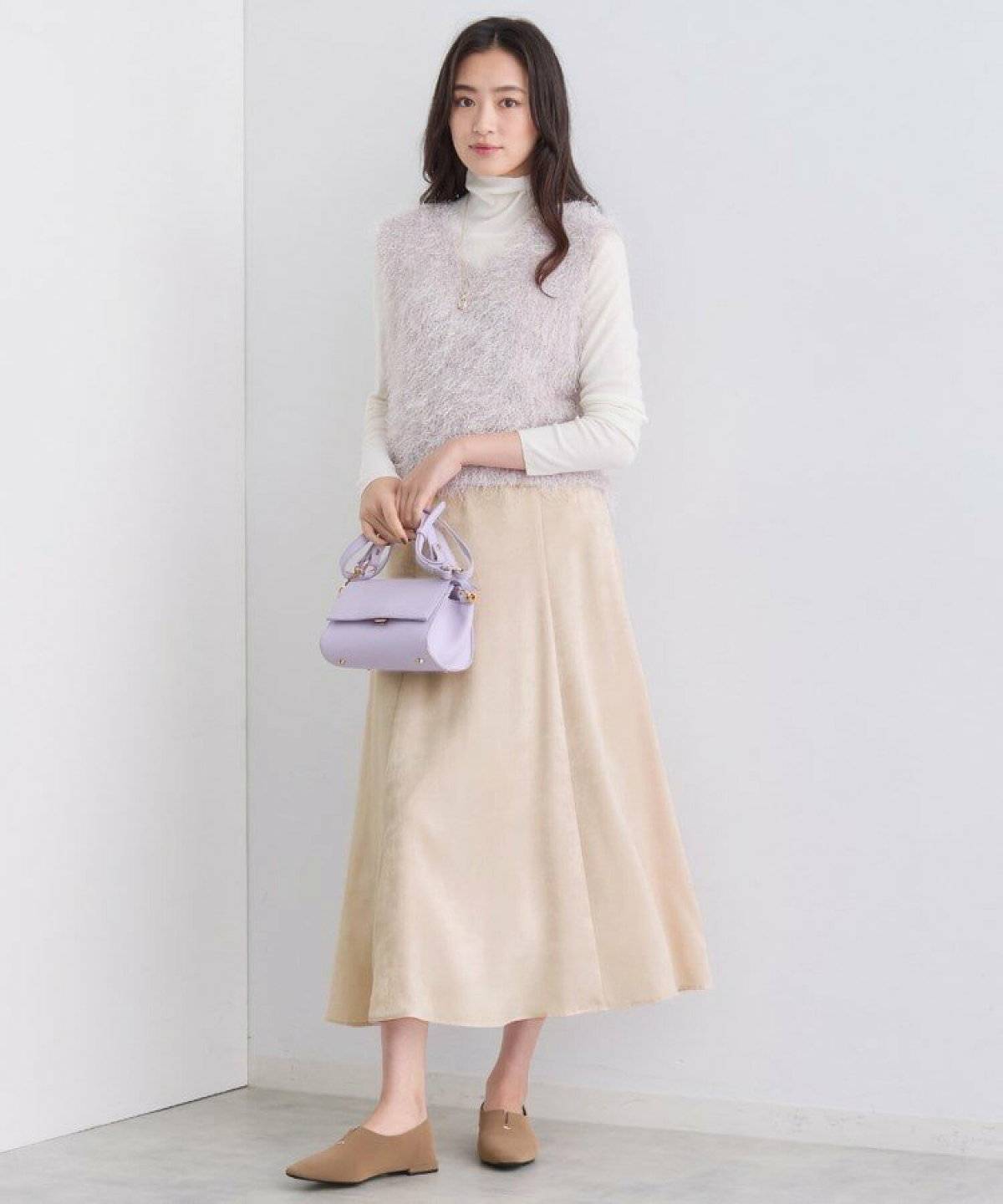 春コーデの女性