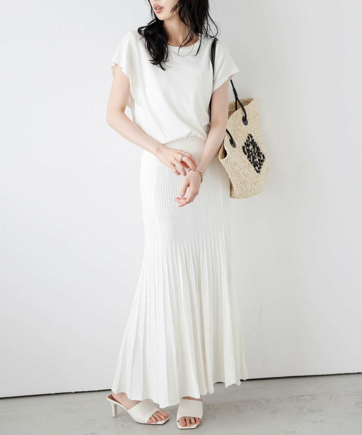 サンダルコーデの女性