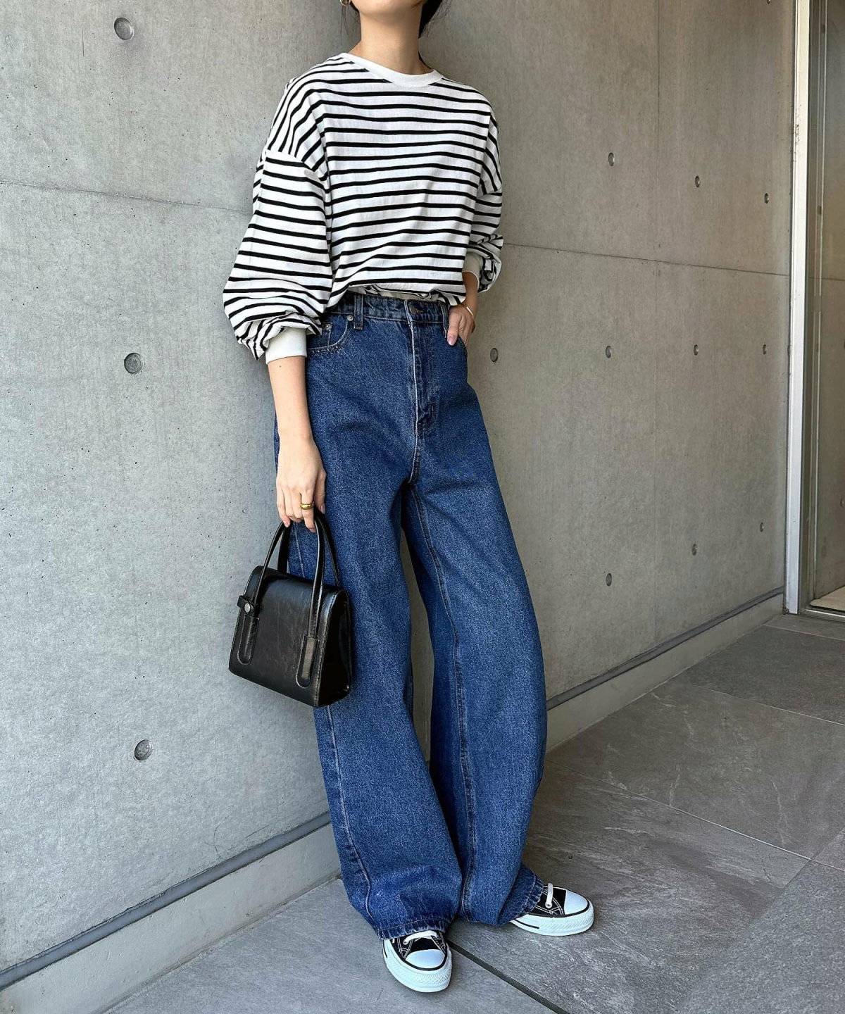 春コーデの女性