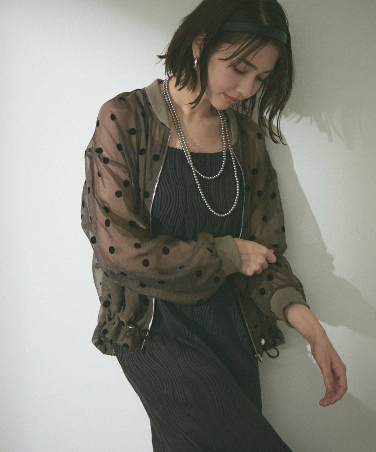 春コーデの女性