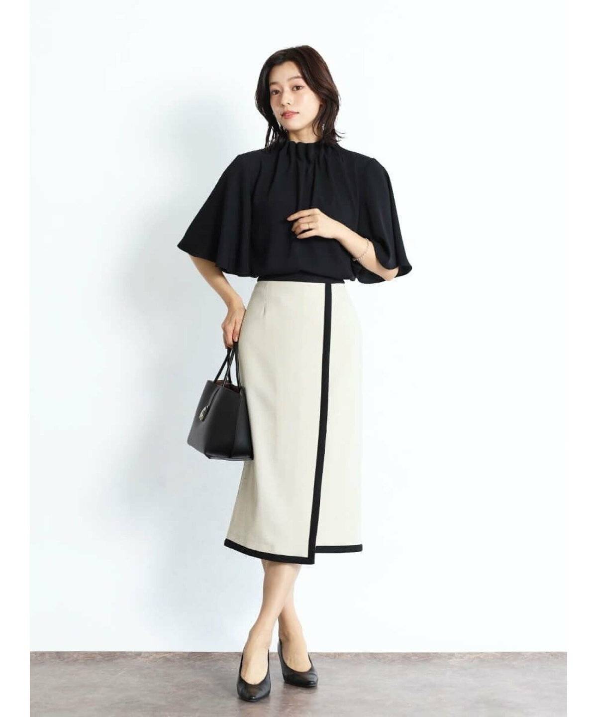 初秋コーデの女性