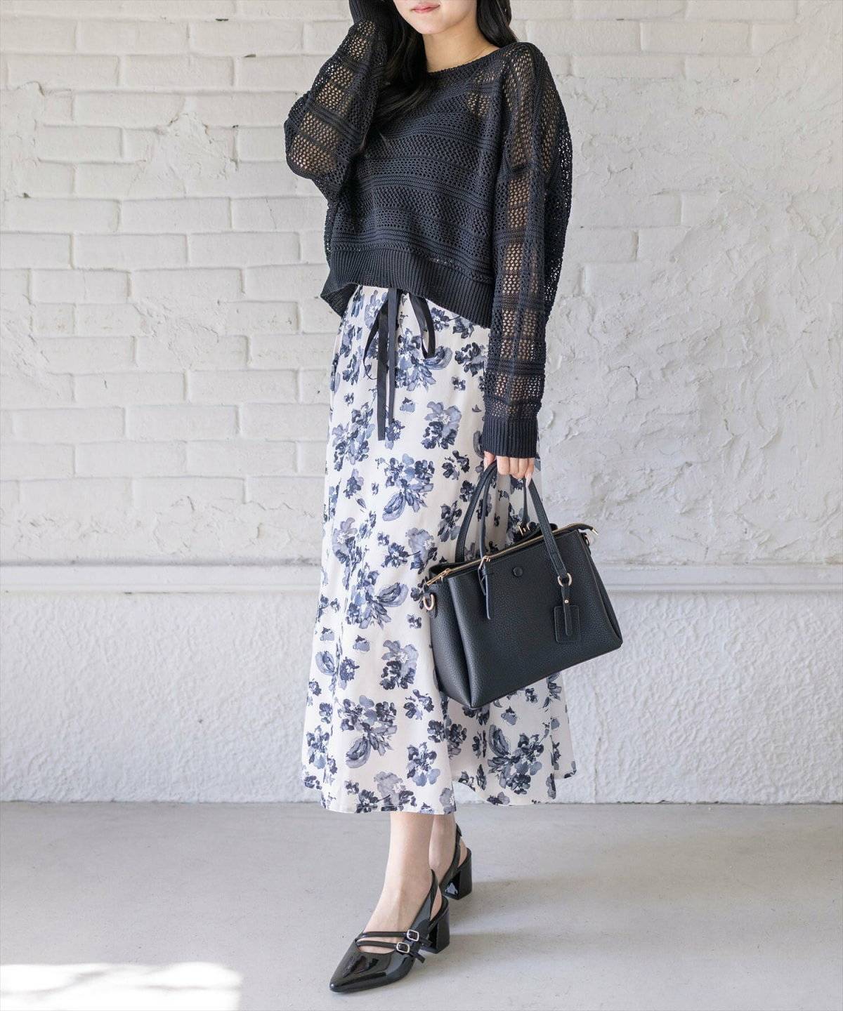 春コーデの女性