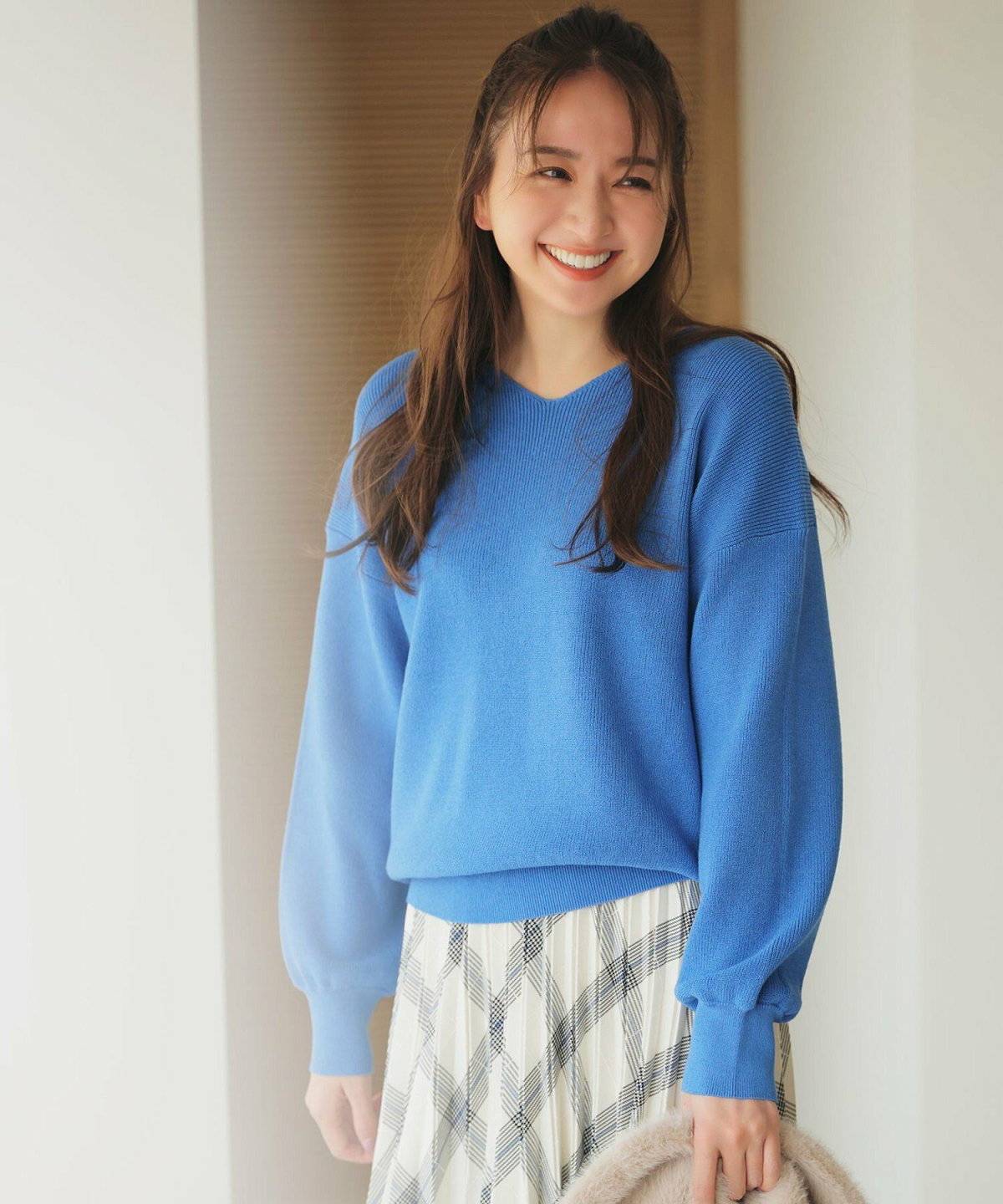 春コーデの女性