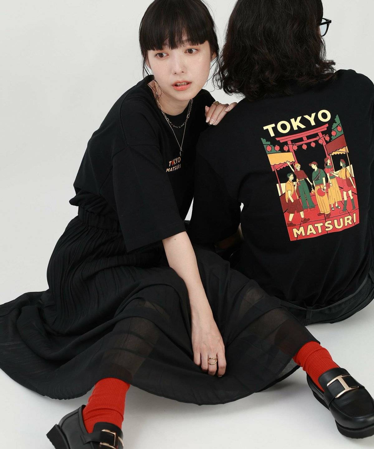 梅雨コーデの女性