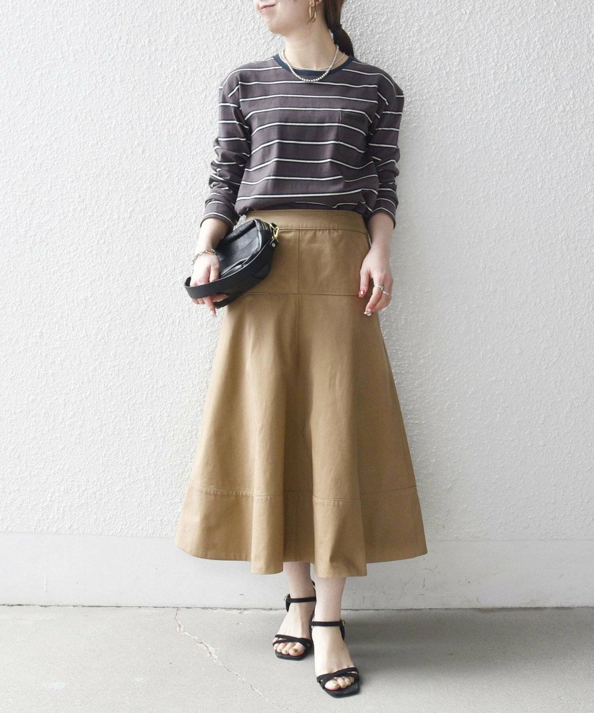 梅雨コーデの女性