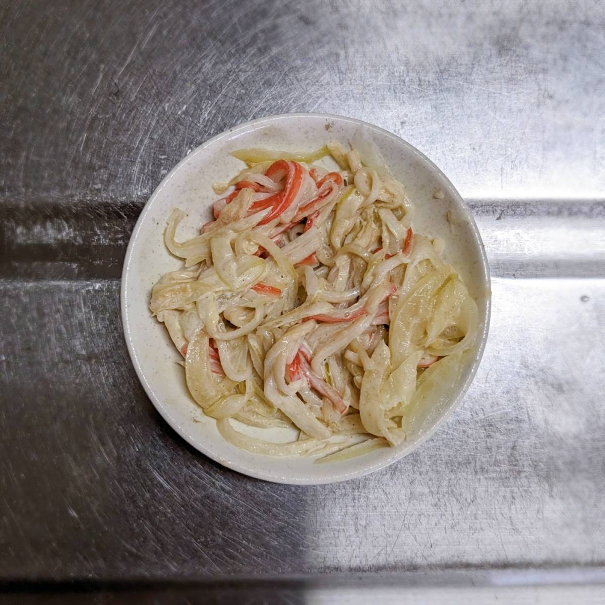 いちまさ公式の「カニかまと新たまねぎのピザ風トースト」のレシピ