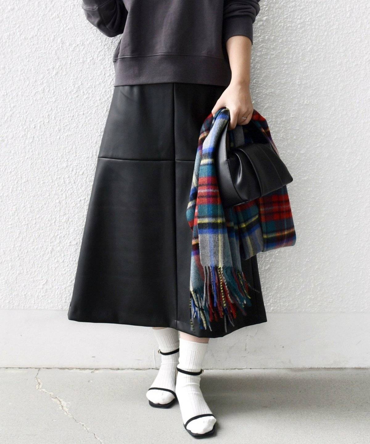 秋コーデの女性