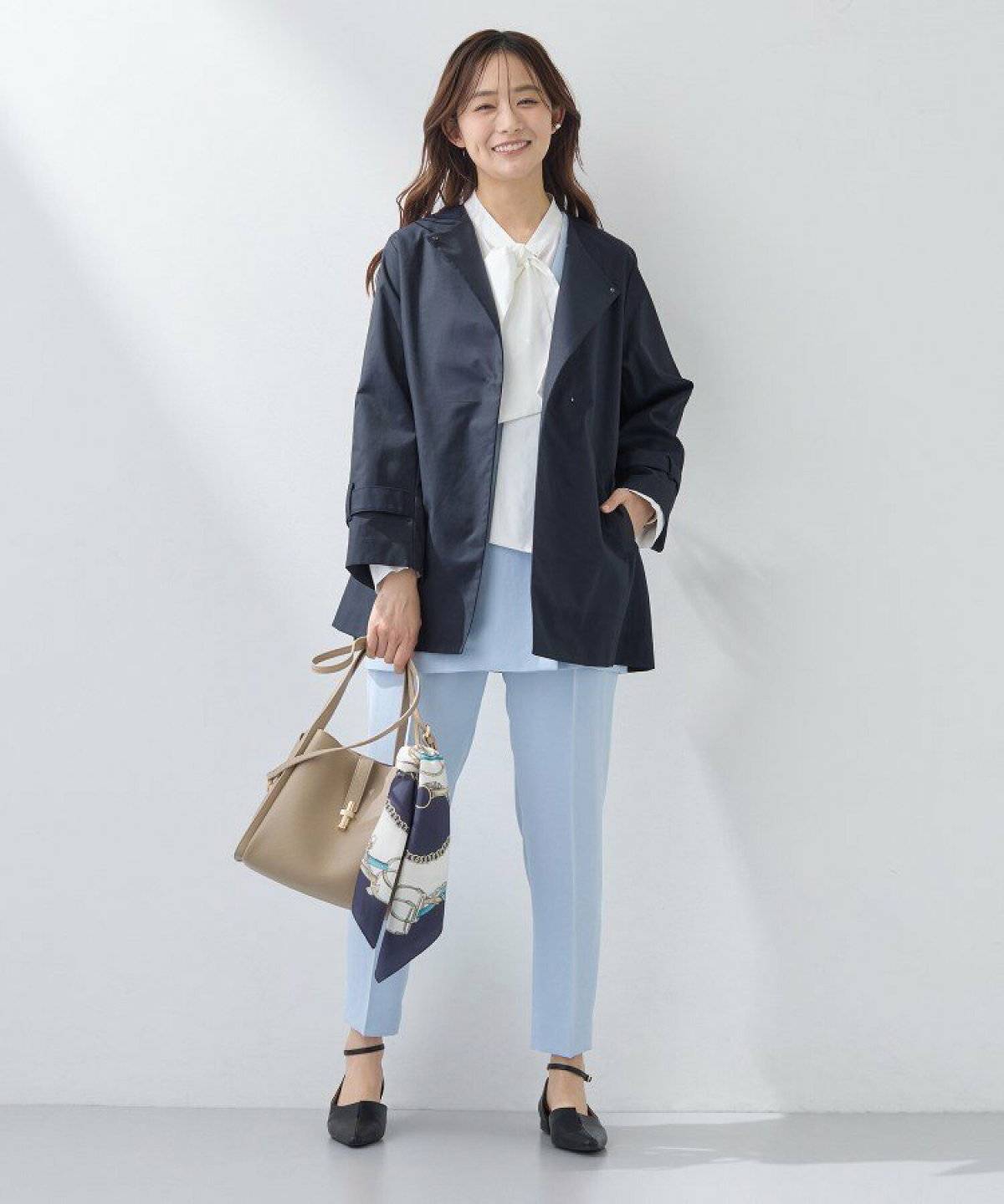 雨の日コーデの女性