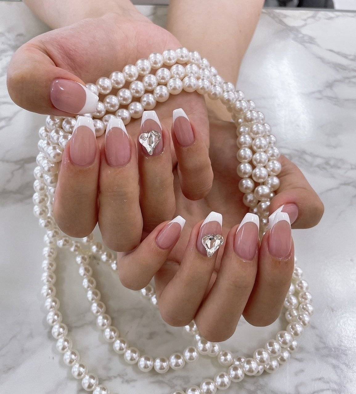 透け感ピンクネイル