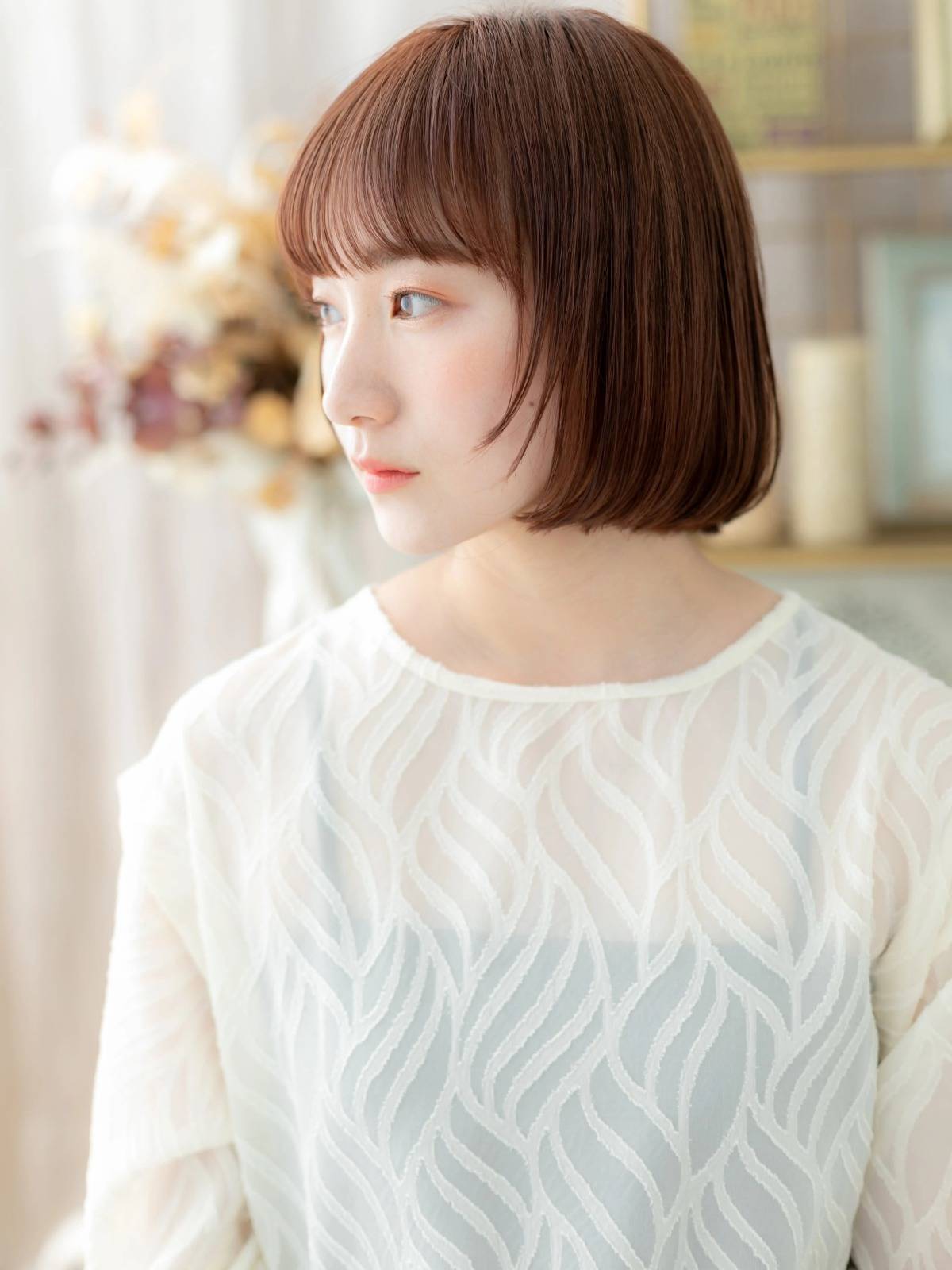 ピンクカラーの丸みボブ