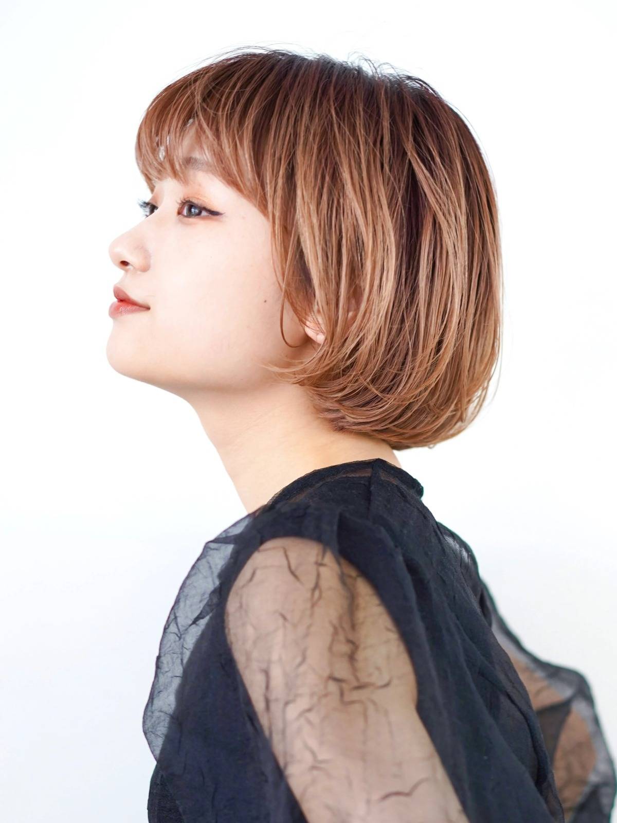 丸みシルエットのフェミニンボブ