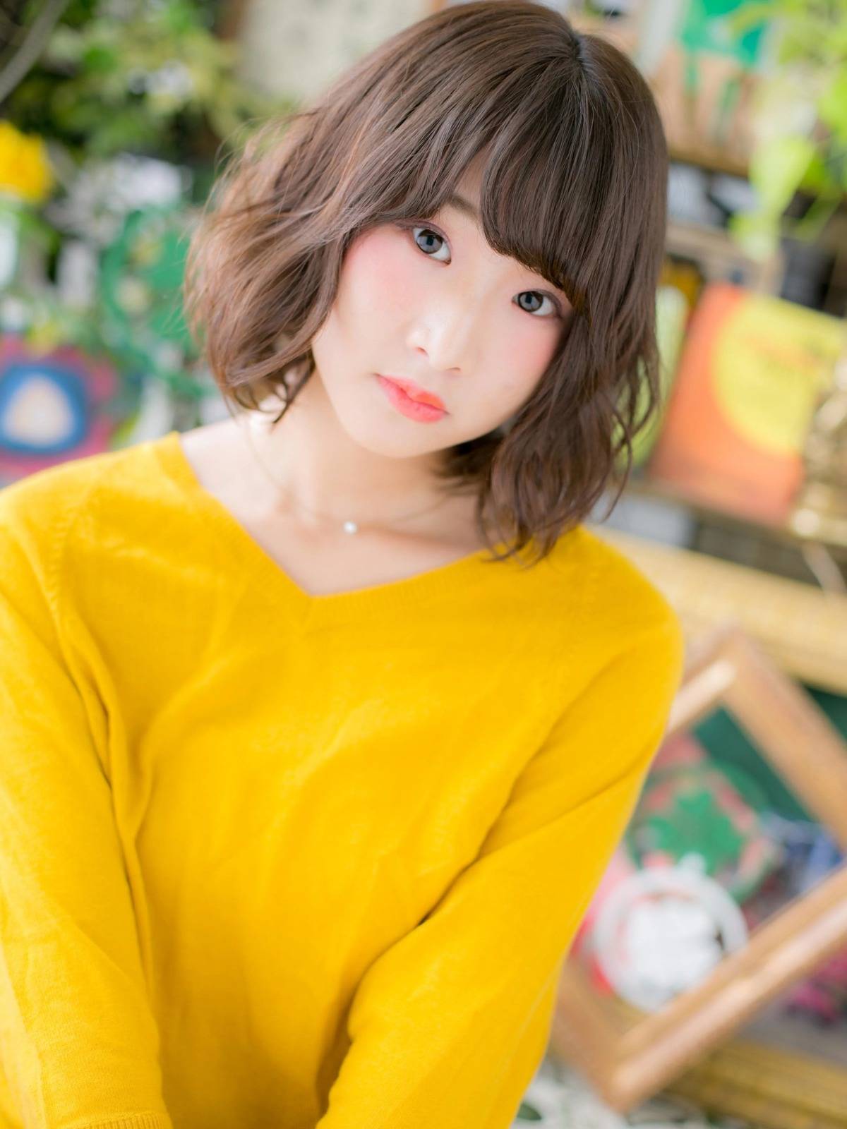 斜め前髪のゆるふわボブ