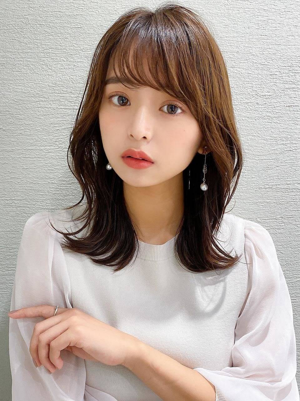 フェミニンなくびれロングボブ