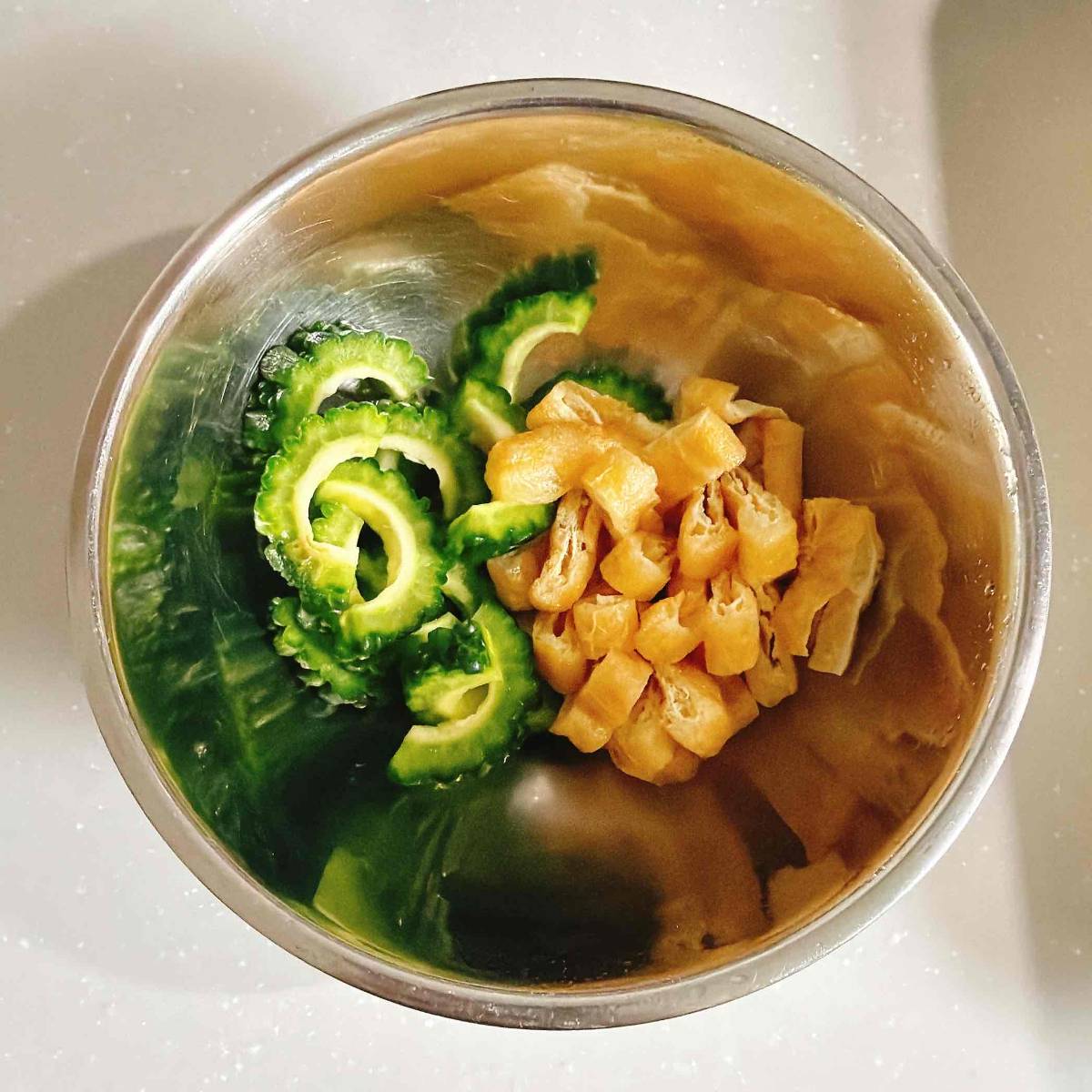 JAグループ公式の「ゴーヤと油揚げの炒め煮」のレシピ
