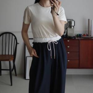 ドローコードがアクセントに。穿くだけで今っぽい「Donoban」のこなれパンツ