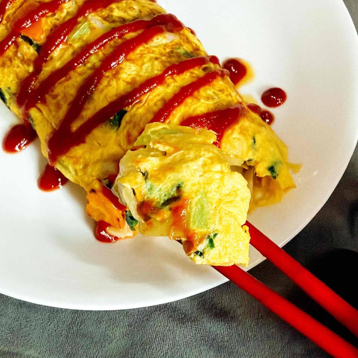 JAグループ公式の「かぼちゃと魚肉ソーセージ小松菜のオムレツ」のレシピ