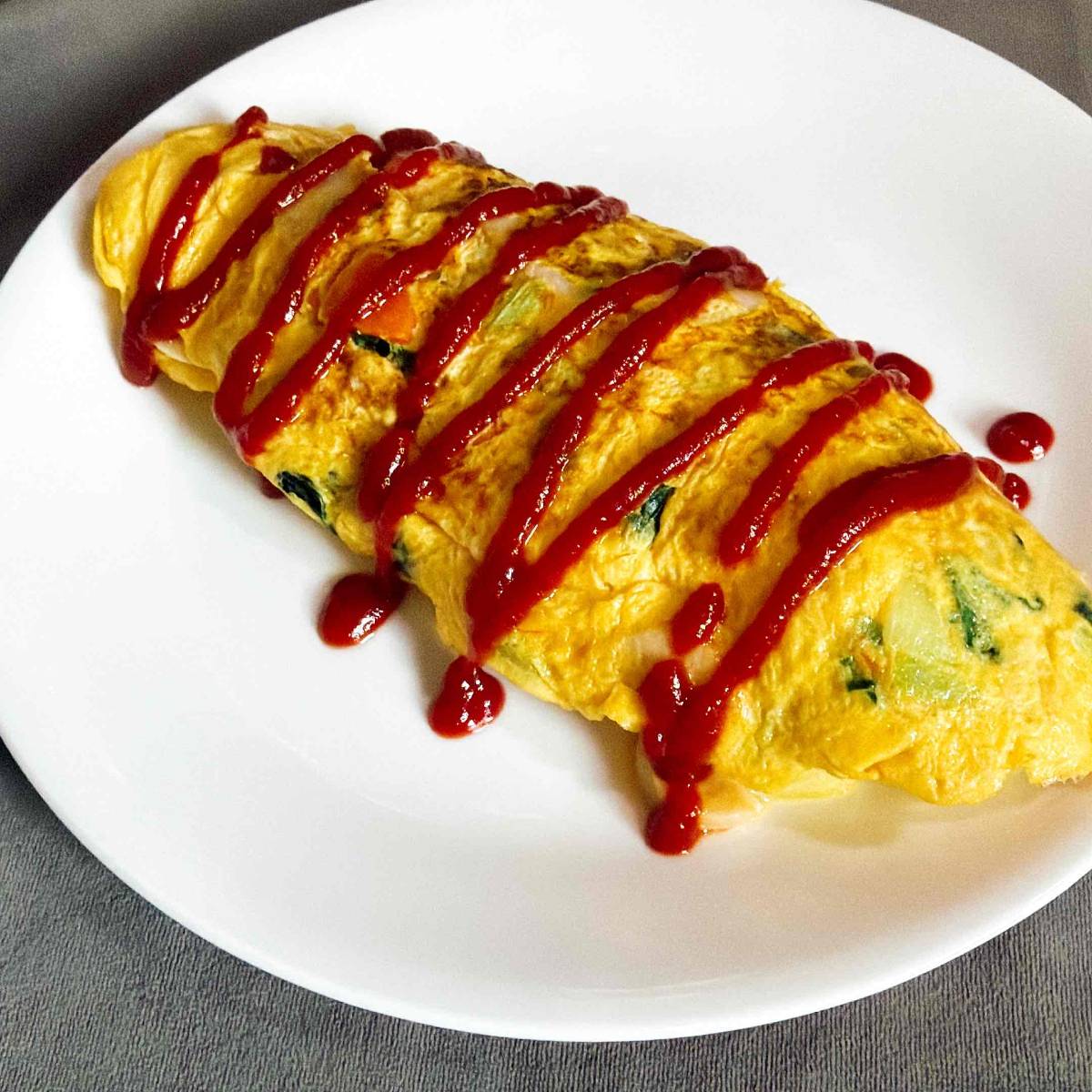 JAグループ公式の「かぼちゃと魚肉ソーセージ小松菜のオムレツ」のレシピ