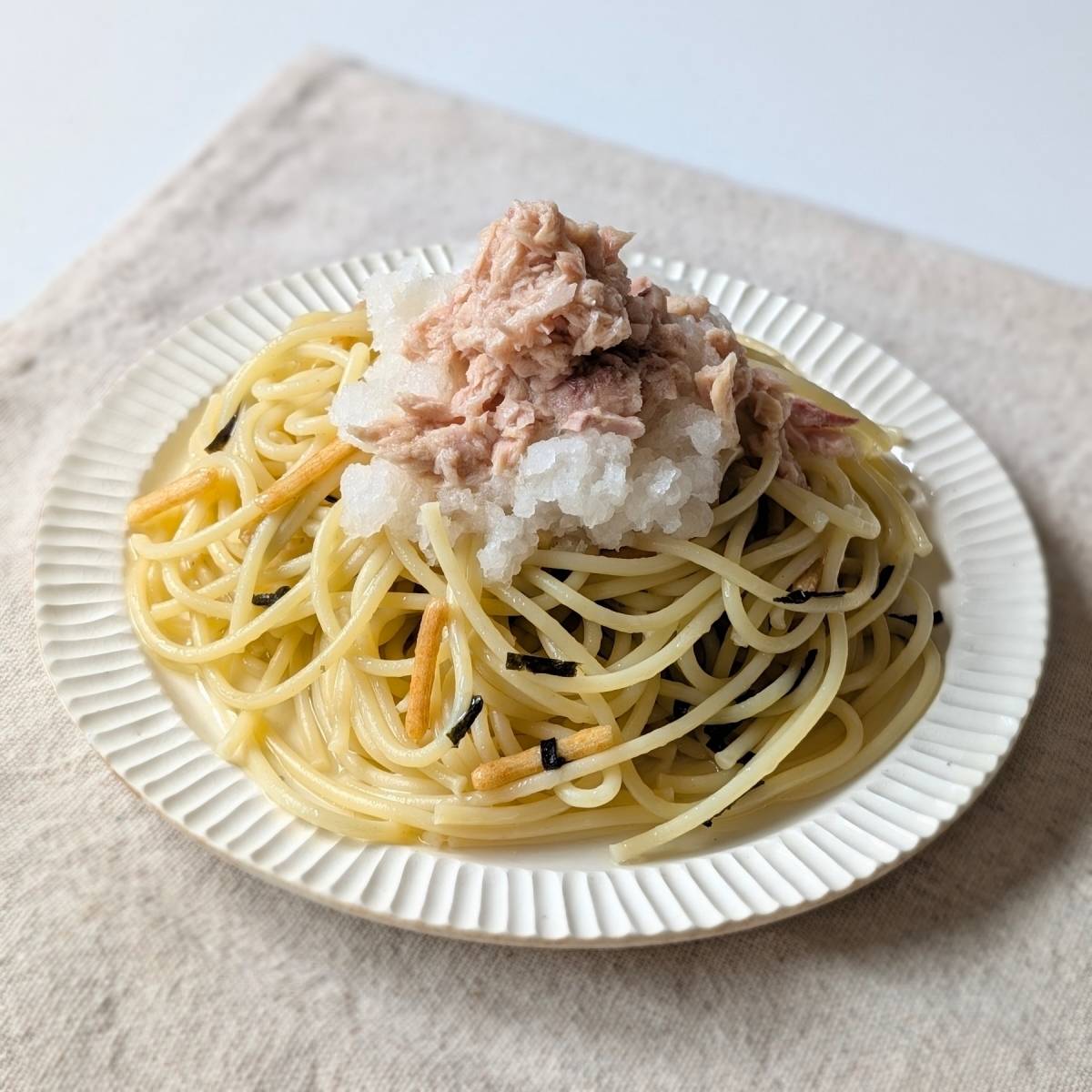 永谷園公式の「お茶づけの素で簡単！ツナと大根おろしのパスタ」のレシピ